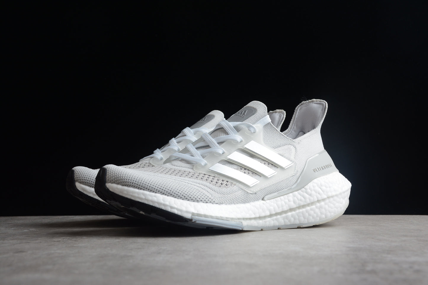 adidas Ultra Boost 21 Triple White Cloud.
