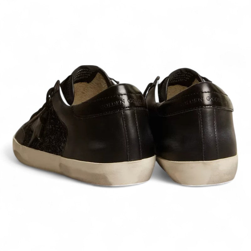 Super-Star in black nappa and glitter with glossy black leather star