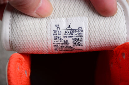Air Jordan 1 Mid GS Orange Suede Sneakers