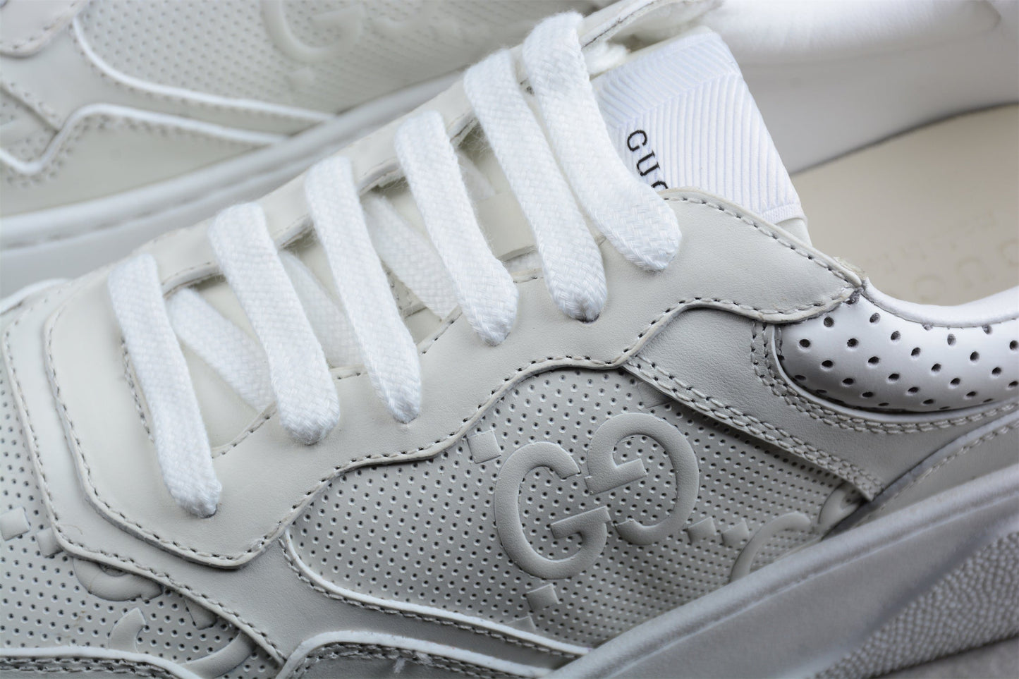 Gucci Embossed GG Logo White Platform Sneakers