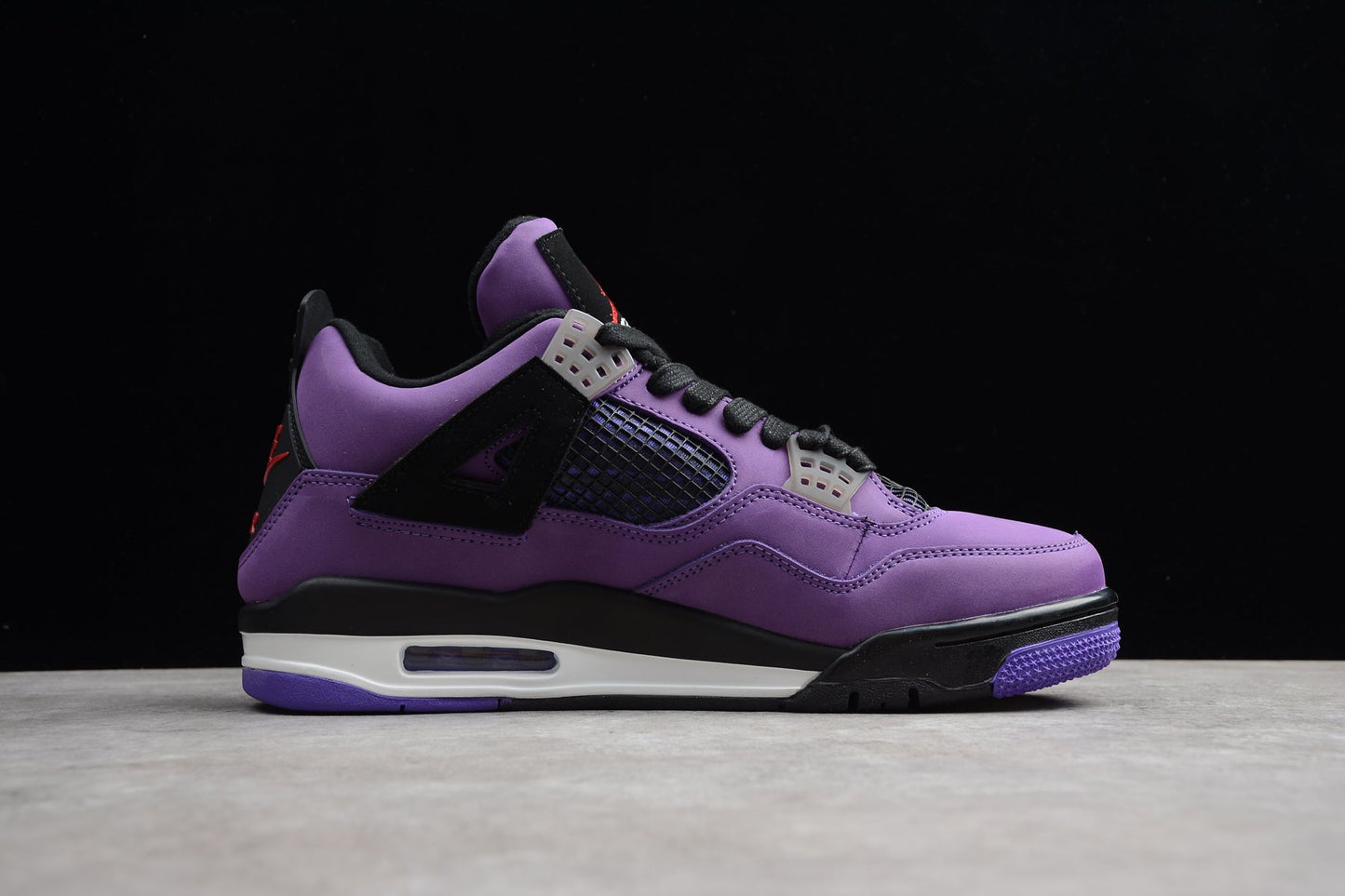 Travis Scott x Air Jordan 4 “Purple”