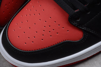 Nike Air Jordan 1 Mid Reverse Bred Sneaker