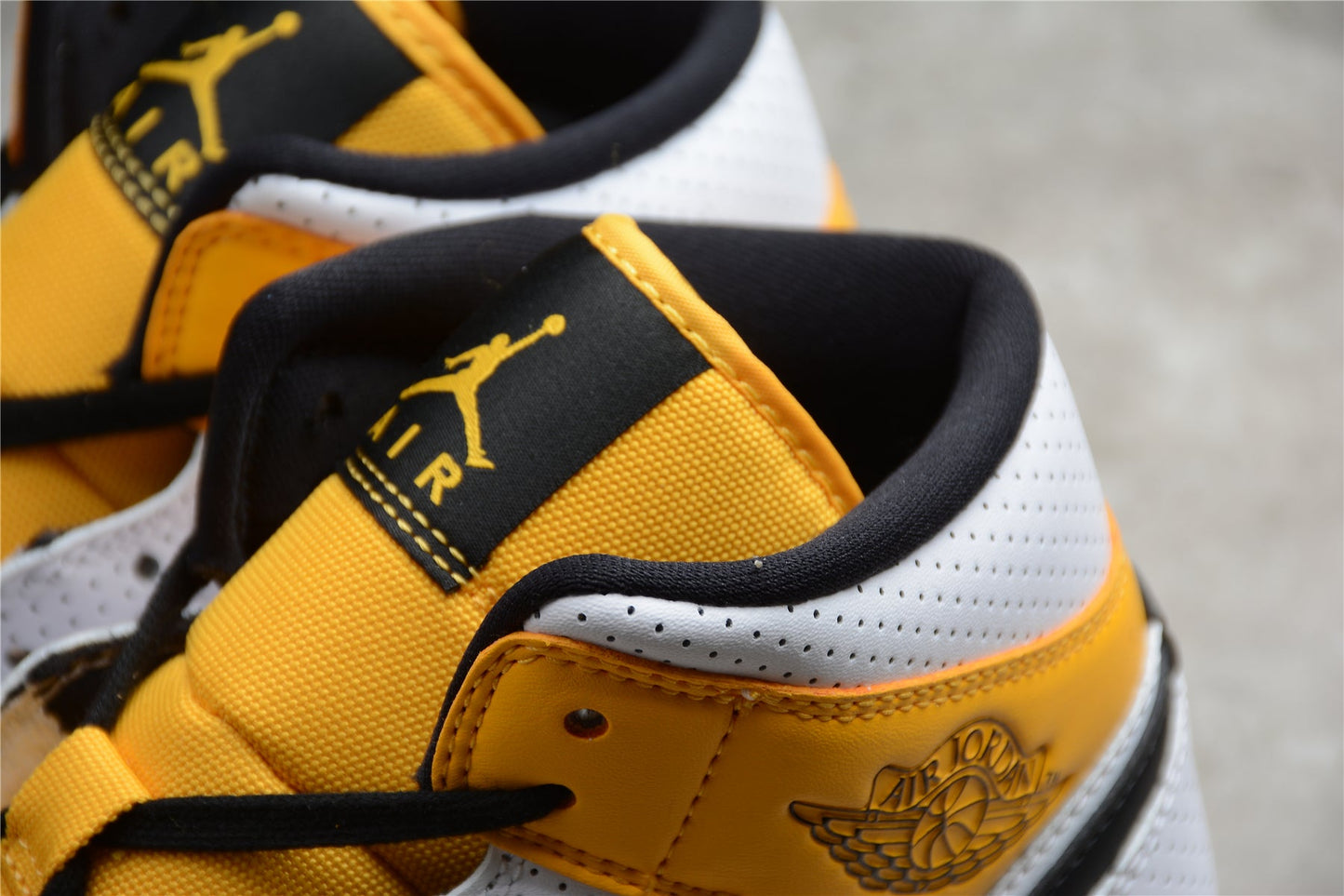 Air Jordan 1 Mid Perforated White University Gold