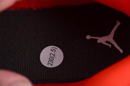 Air Jordan 1 Mid GS Orange Suede Sneakers