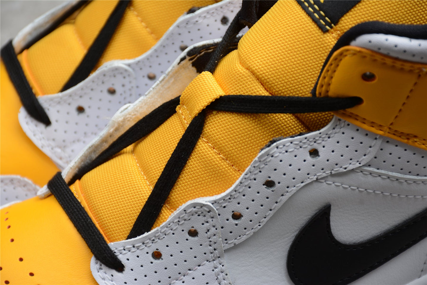 Air Jordan 1 Mid Perforated White University Gold