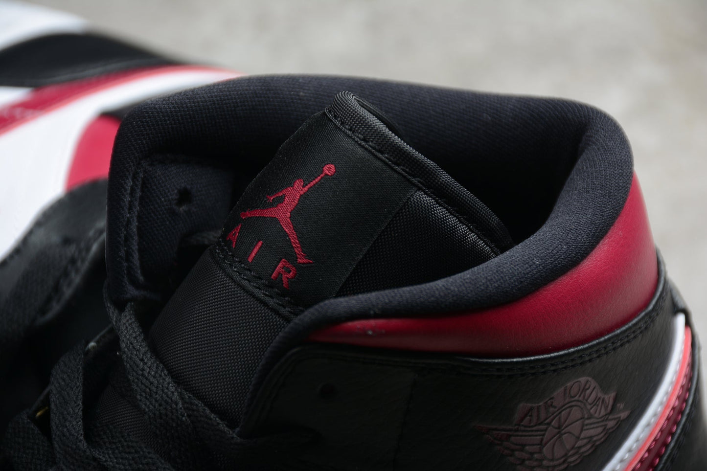 Nike Air Jordan 1 Mid "Bred Toe" (Black/Red/White)