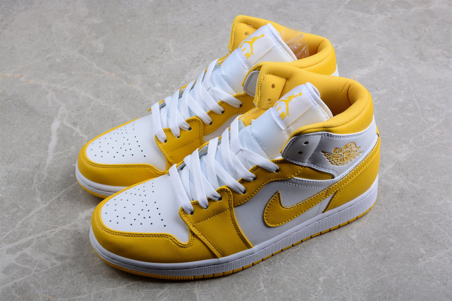 Nike  Air Jordan 1 Mid 'University Gold White'