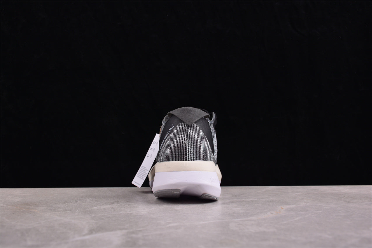 Adidas Adizero Boston 12 Low in Black/White