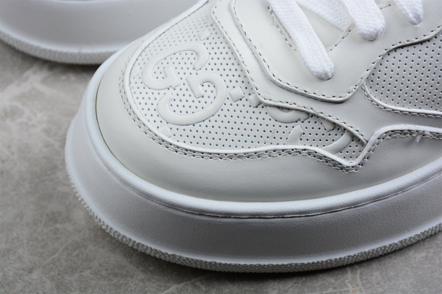 Gucci Embossed GG Logo White Platform Sneakers