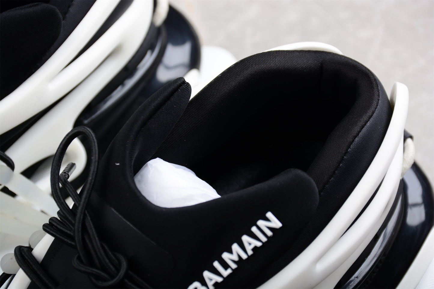 Balmain Unicorn Low-Top Sneakers in White/Black – Neoprene and Leather