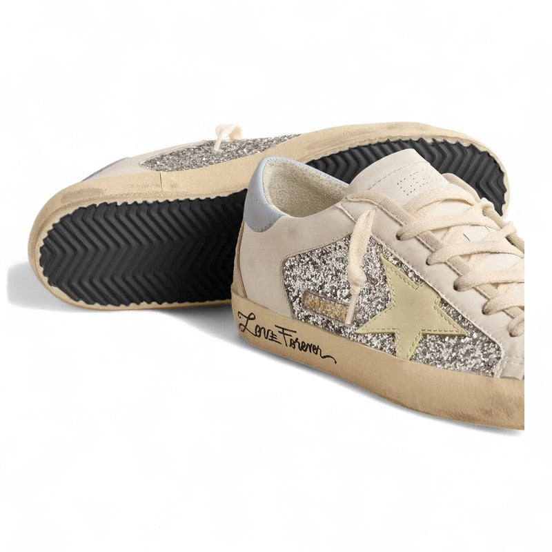 Bio-based Super-Star sneakers with silver glitter and a yellow leather star