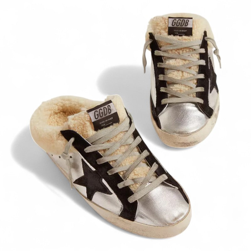 The Super-Star Sabot in silver laminated leather with a black star